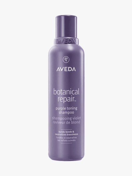 Aveda Botanical Repair Purple Toning Shampoo in branded component on a light gray background